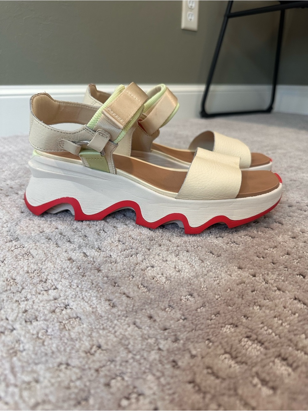 Sorrel Kinetic Cream Platform Sandal with Red Wave Sole